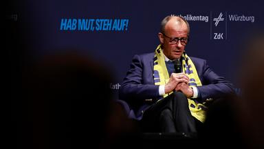 Störer, Einsichten und eine Warnung: Merz auf Katholikentag